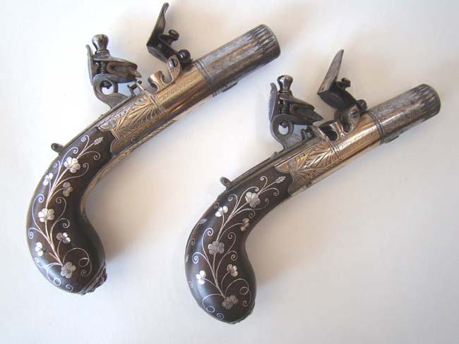 A Cased pair of Antique silver mounted Flintlock Pocket Pistols by James Collins, London, circa 1825-1832 — image 2